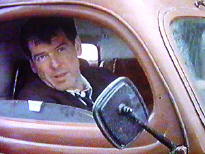 Pierce Brosnan on board his E83W in Evelyn